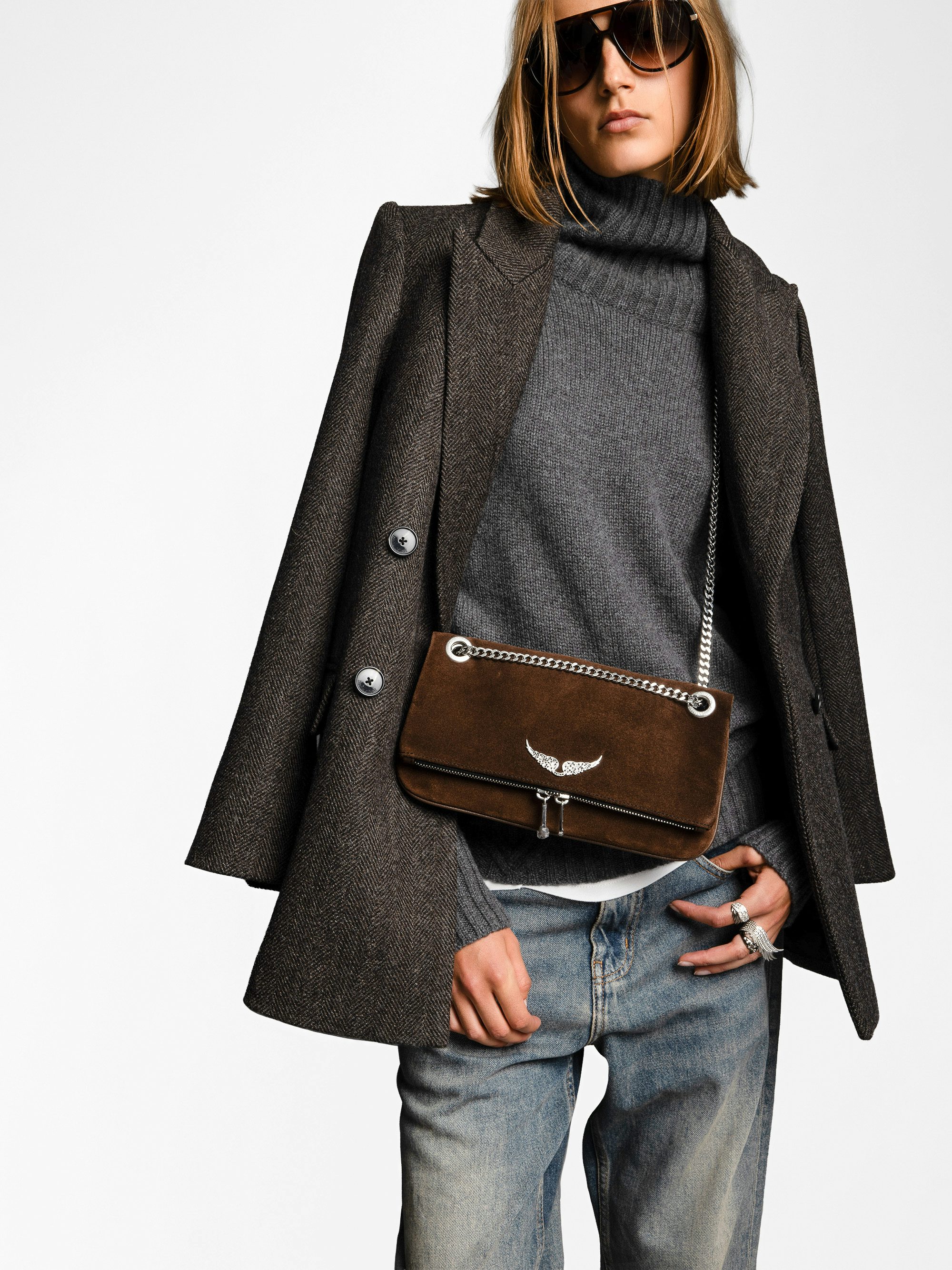 Rock II Suede Clutch - Suede leather clutch with sliding metal chain and signature wings.